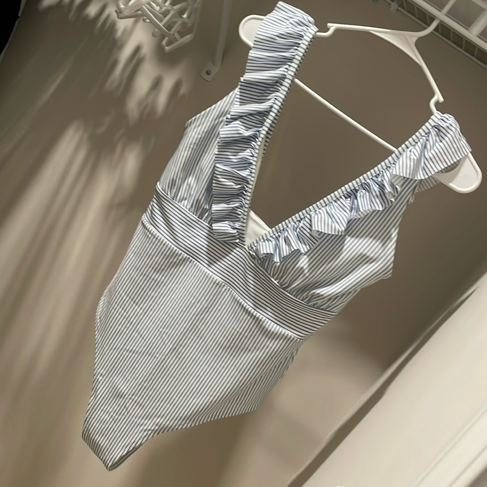 Size 14 blue and white striped one piece swimsuit.